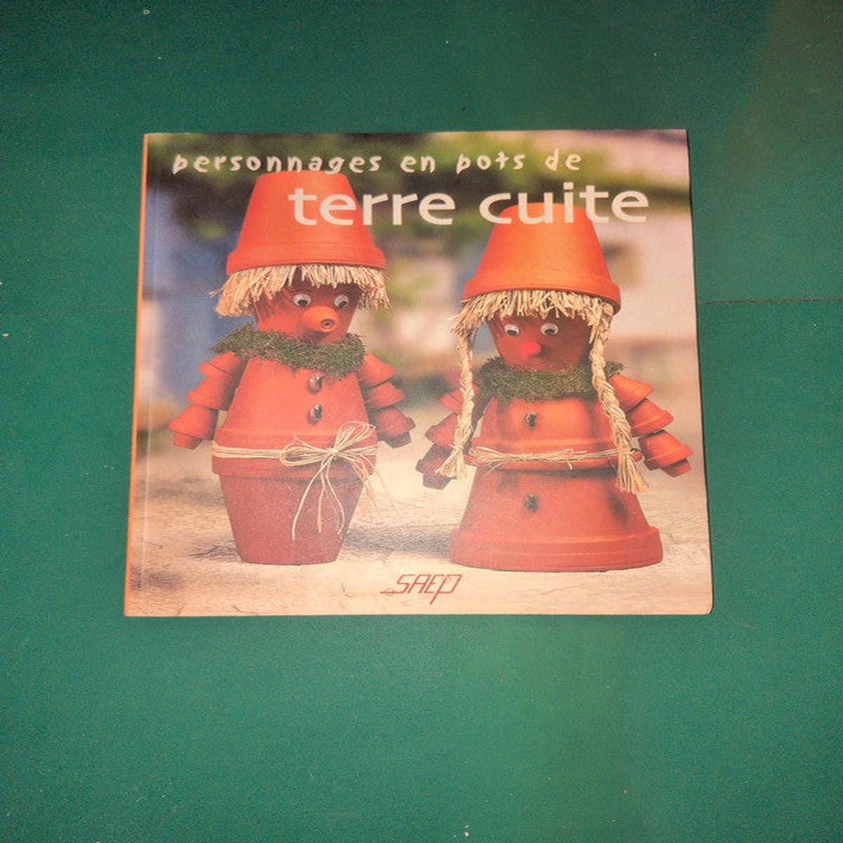 Used book  Terracotta Pot People